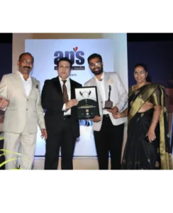 Dr. Amit Borade receiving the award for Leading Educational Consultancy - 2019 from Govinda