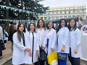 group of students standing in front of Tbilisi State Medical University